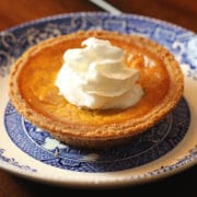 mini pumpkin pie with whipped cream