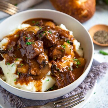 bowl of french beef stew in white bowl