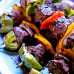 filet mignon kebabs in red wine marinade with vegetables