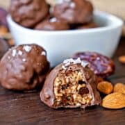 Chocolate cip truffle made with dates and ground nuts covered with melted chocolate