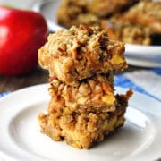 A plate of food, with Apple and Cinnamon oatmeal bars