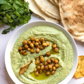 This Cilantro Jalapeno Hummus is an easy, healthy dip made in minutes with fresh ingredients. Great as a spread, too! www.keviniscooking.com