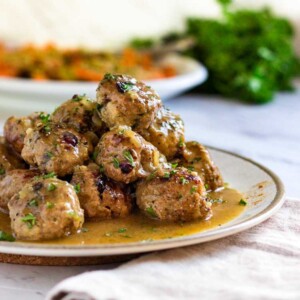 Super moist, tender and packed with flavor, these Cranberry Turkey Meatballs are great any time of year! A quick pan sauce coats them, easily serve as an appetizer or with a side for a meal. Not dried out lumps, these meatballs are beyond and a family favorite! www.keviniscooking.com
