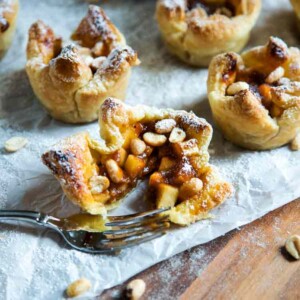 An incredible combination of flavors, these Apple Peanut Butter Tarts have it all. Puff pastry encases peanut butter, topped with diced apples, a dab of apple butter and peanuts. Baked to a golden delicious, no pun intended, finish, these are the best little desserts that deliver big on flavor. www.keviniscooking.com
