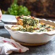 A healthy alternate to a traditional quiche with crust, this Crustless Spinach Quiche with Ham is packed with spinach, cheeses and ham for that lighter breakfast touch. www.keviniscooking.com