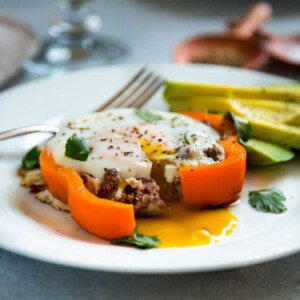 These Breakfast Stuffed Peppers have beef, salsa, cheese and a beautiful egg to top off one hearty and delicious breakfast. You need this one, and making a batch for the family is easy! keviniscooking.com