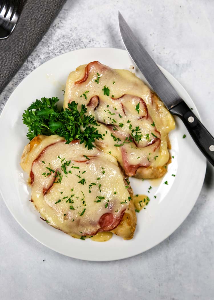I call this one pan Open Faced Chicken Cordon Bleu my "skinny" version of the classic. With ham, Swiss and dijon, it isn't breaded and fried, it gets baked! keviniscooking.com