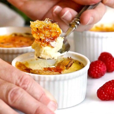 closeup: spooning out french vanilla dessert from ramekin