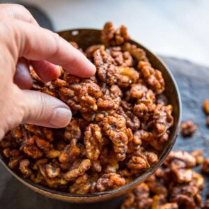 These addictive Smokey Spiced Walnuts get toasted in the oven after getting coated in a warm blend of curry powder, soy sauce, melted butter and Tabasco. keviniscooking.com
