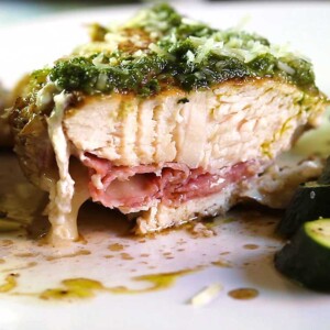 With a few on hand ingredients like pesto, mozzarella cheese and deli meat, this Cheesy Prosciutto Stuffed Chicken with Pesto is on the table in 30 minutes! keviniscooking.com