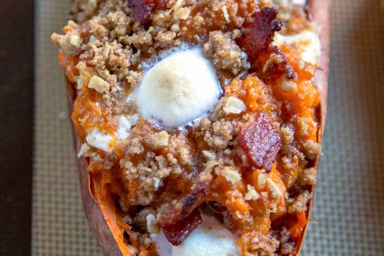 These Loaded Twice Baked Sweet Potatoes have sweet brown sugar streusel and marshmallows to savory bacon all mixed with buttery mashed sweet potato. keviniscooking.com