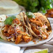 These Honey Lime Chipotle Chicken are a smash hit every time. Grilled or sautéed, the citrus marinade, warm spices, fresh herbs & honey make it a flavor explosion. With a Ranch Apple Slaw on top these are fantastic tacos. keviniscooking.com