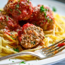 Classic Beef Meatballs. Round, tender, juicy, not dried out and packed with flavor. Mine use ground beef, are light in breadcrumbs, get added fat from ricotta cheese and are seasoned beautifully with red pepper flakes and ground fennel. keviniscooking.com