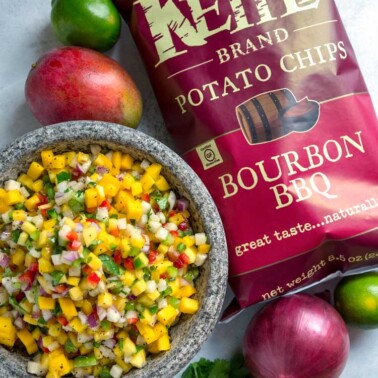 This south of the border, tropical influenced, Mango Pico de Gallo is a hit every time. Sweet and tangy pieces of mango mixed with diced peppers, jicama, red onion and cilantro all marinate in fresh lime juice, cumin and garlic. 