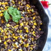 These Mexican Beans and Corn (Frijoles con Elote) get a flavor boost from a mixture called a sofrito that’s made of chiles, onion and garlic dry roasted then blended together. Top with cheese and pumpkin seeds and it's a fantastic side dish.