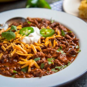 double meat hearty chili in white bowl