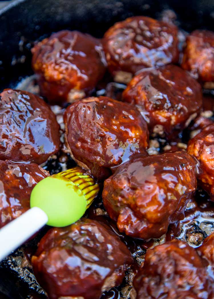 close up image of bbq sauce coated ground beef balls