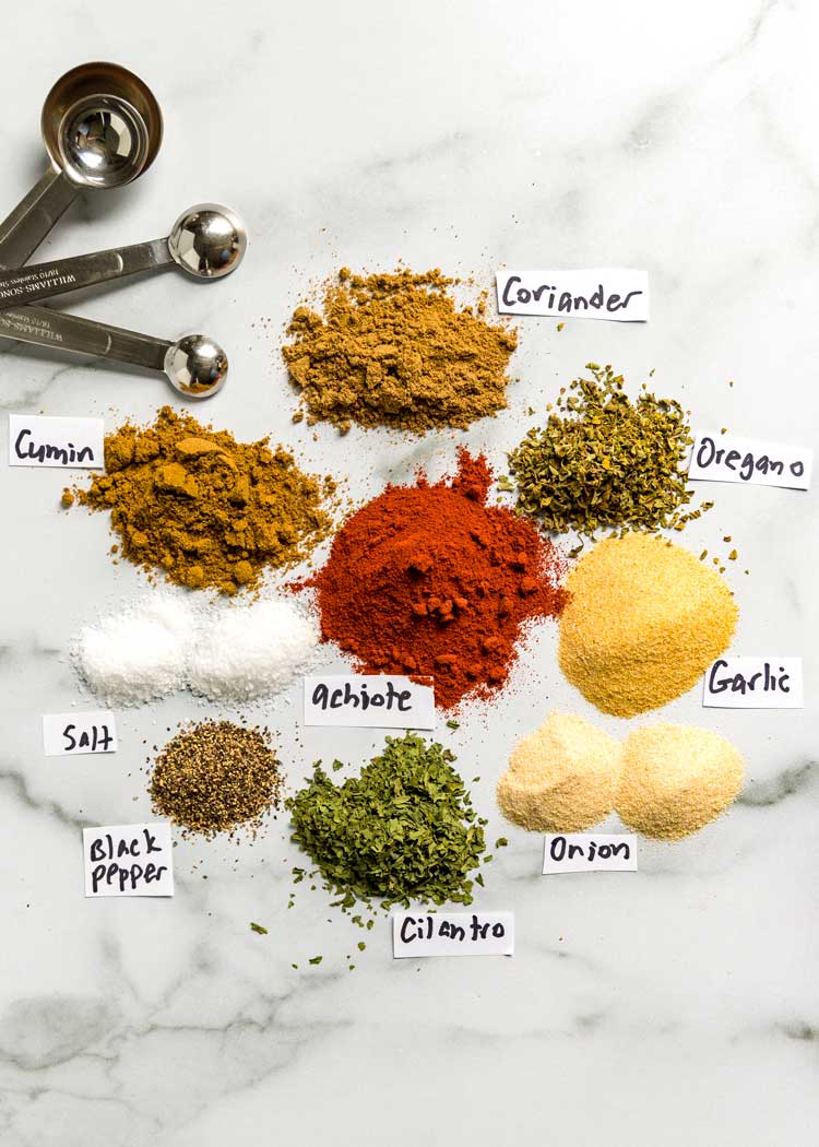 overhead: counter with small piles of Latin spices