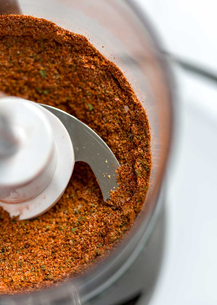 closeup: spices for my sazon seasoning recipe in food processor bowl