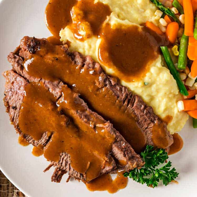slices of Yankee Pot Roast and gravy and vegetables