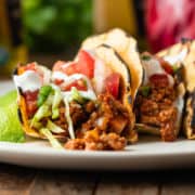 plate of Mexican tacos with ground pork