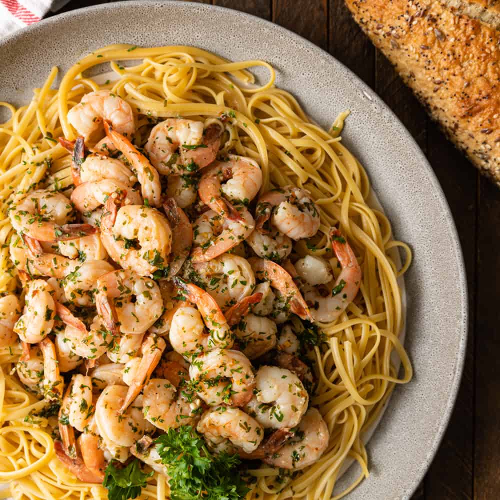 sauteed shrimp on pasta with parsley