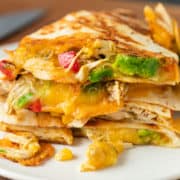 stack of crispy chicken quesadillas on a plate