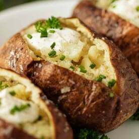 the perfect baked potatoes, topped with sour cream and chives