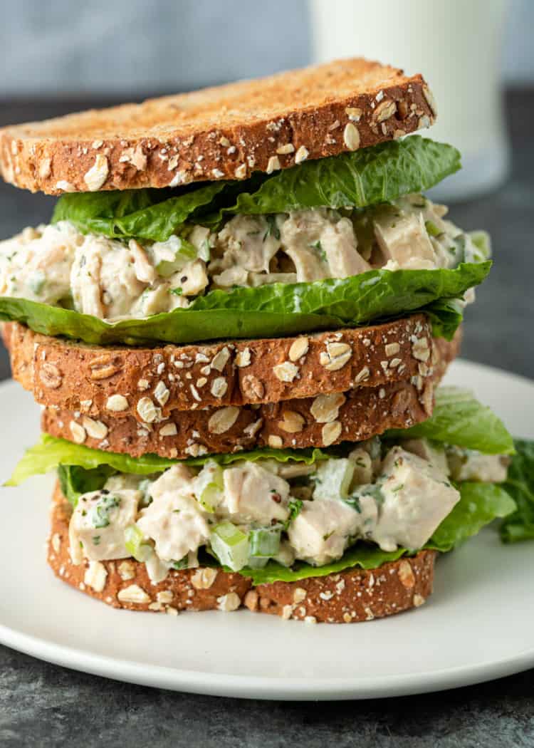 two stacked keto chicken salad sandwiches on white plate