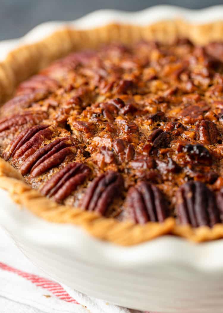 closeup: whole pecans baked onto top of pie