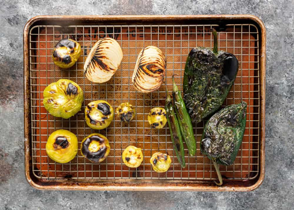 overhead: roasted vegetables, chiles for green sauce