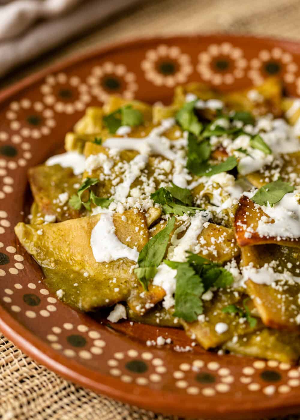 closeup of chilaquiles verdes on plate