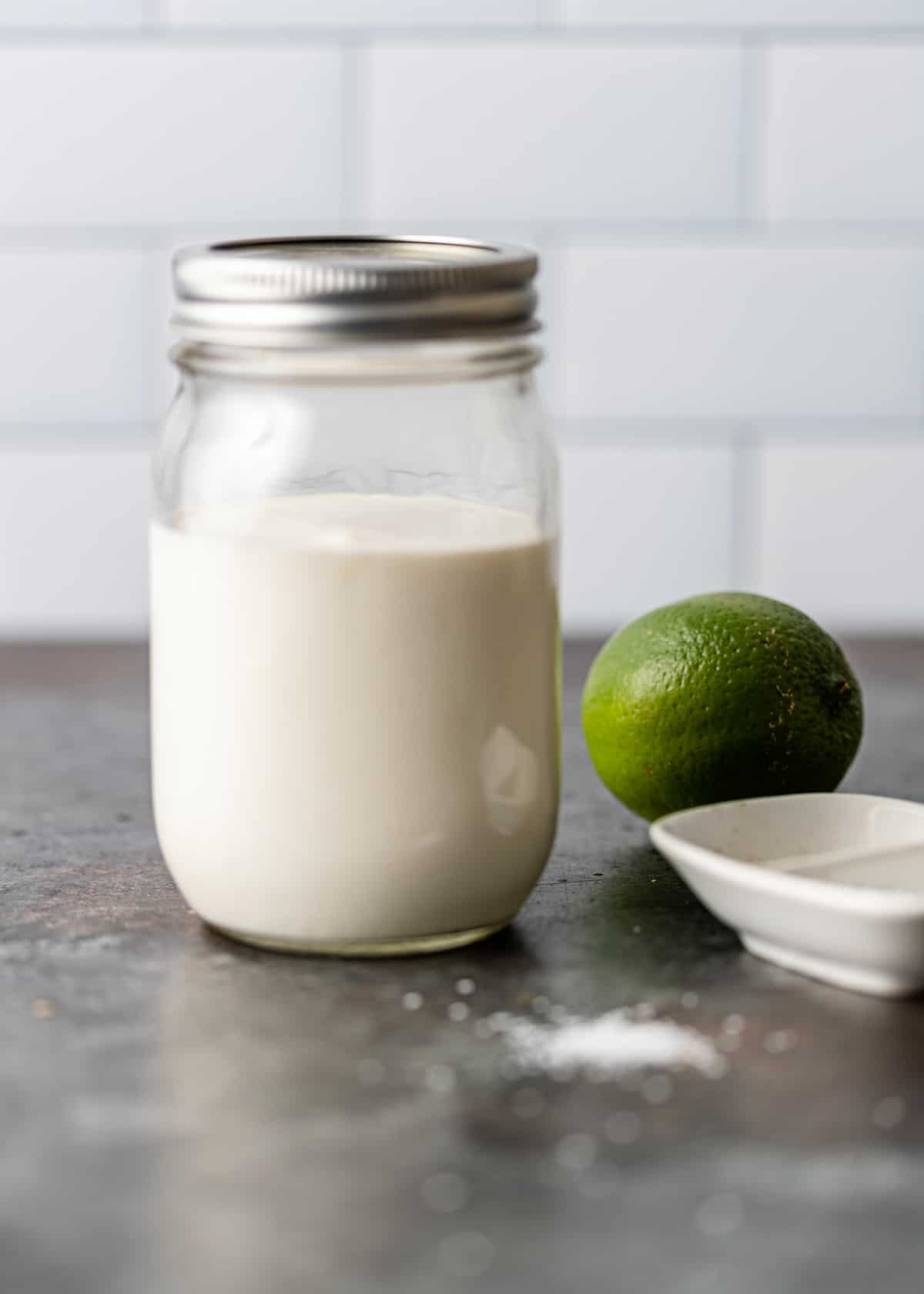 mexican crema in mason jar with lime