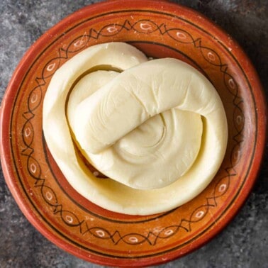 oaxaca cheese spiral on brown plate