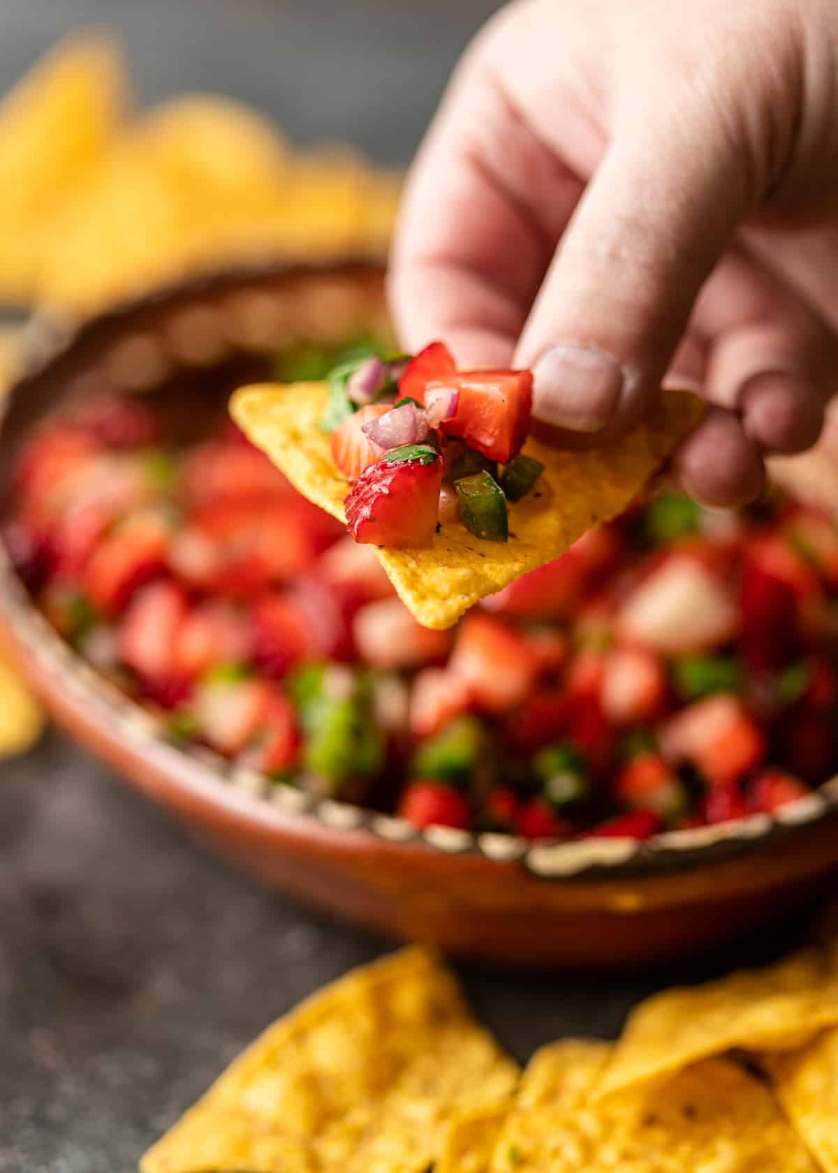 strawberry salsa on a chip, ready to eat