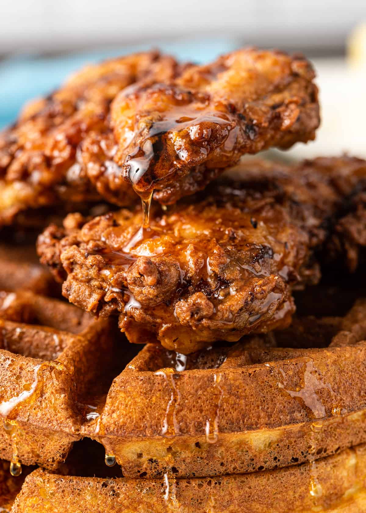 closeup: my chicken and waffles recipe drizzled in syrup