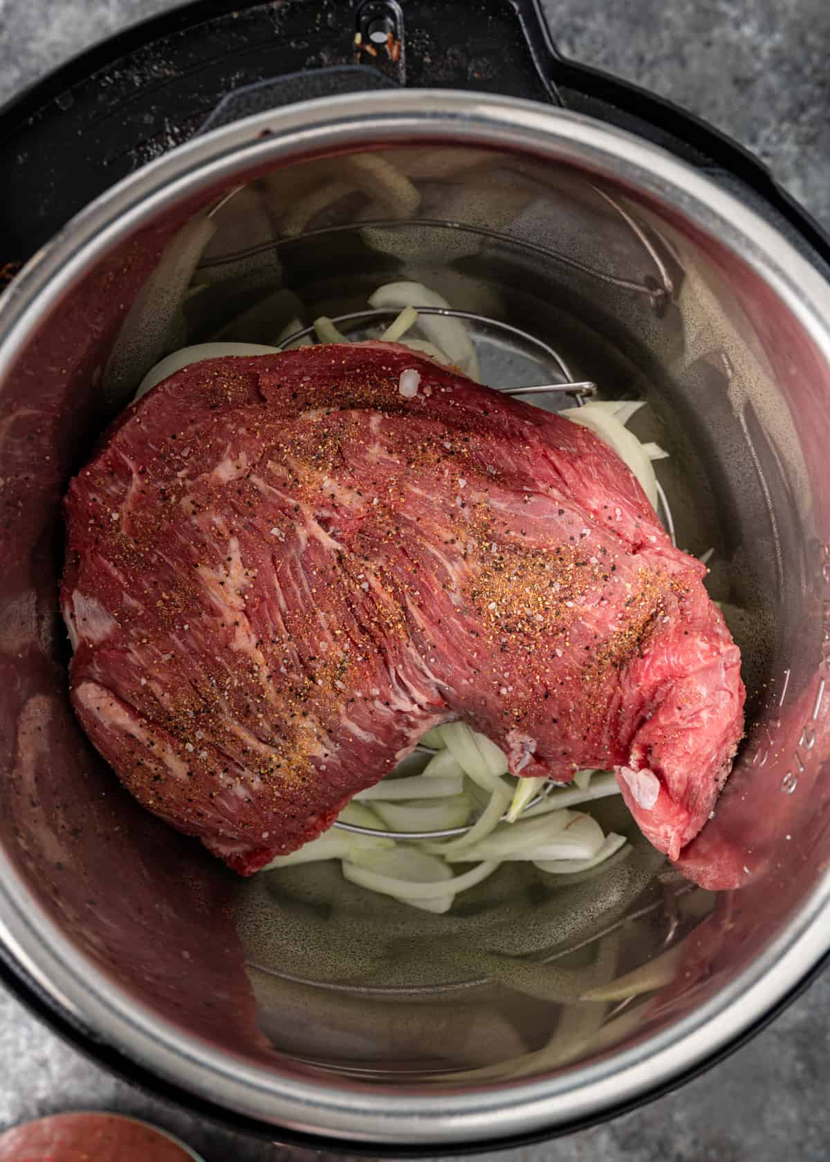 overhead view of instant pot with trip tip
