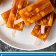 mango chile ice pops stacked on plate