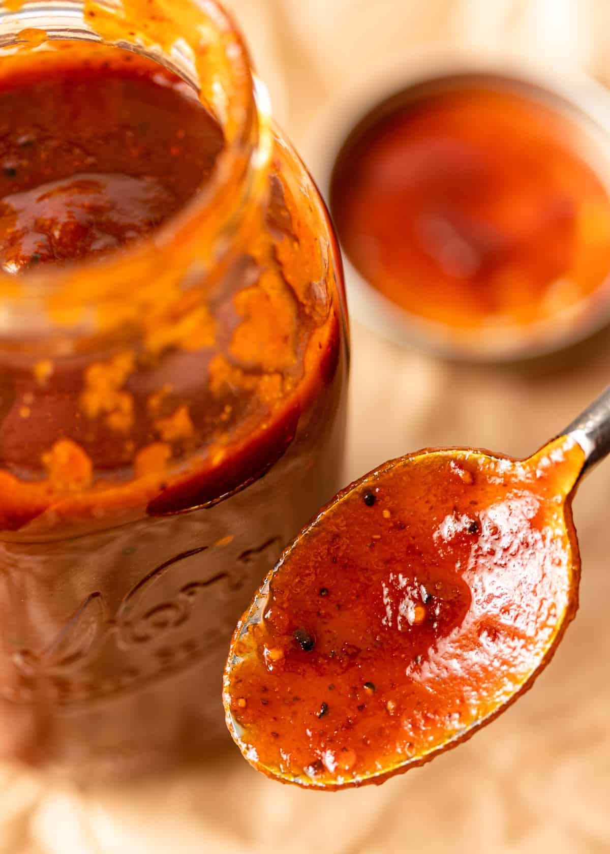 close up of homemade BBQ sauce recipe on a spoon