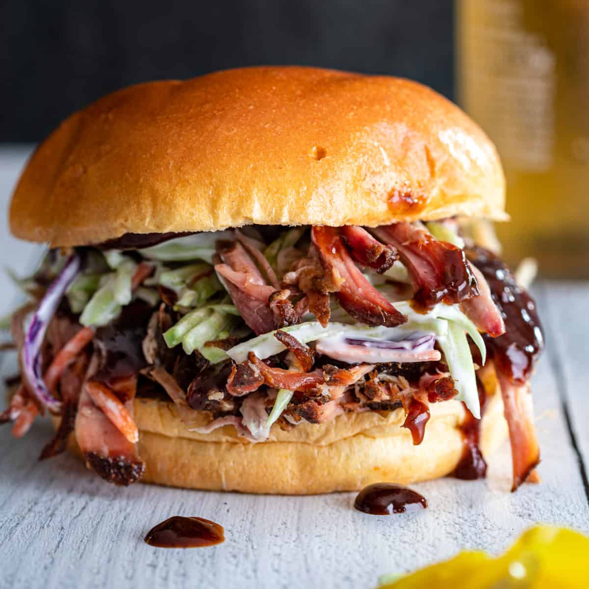 pulled pork sandwich with bbq sauce and coleslaw