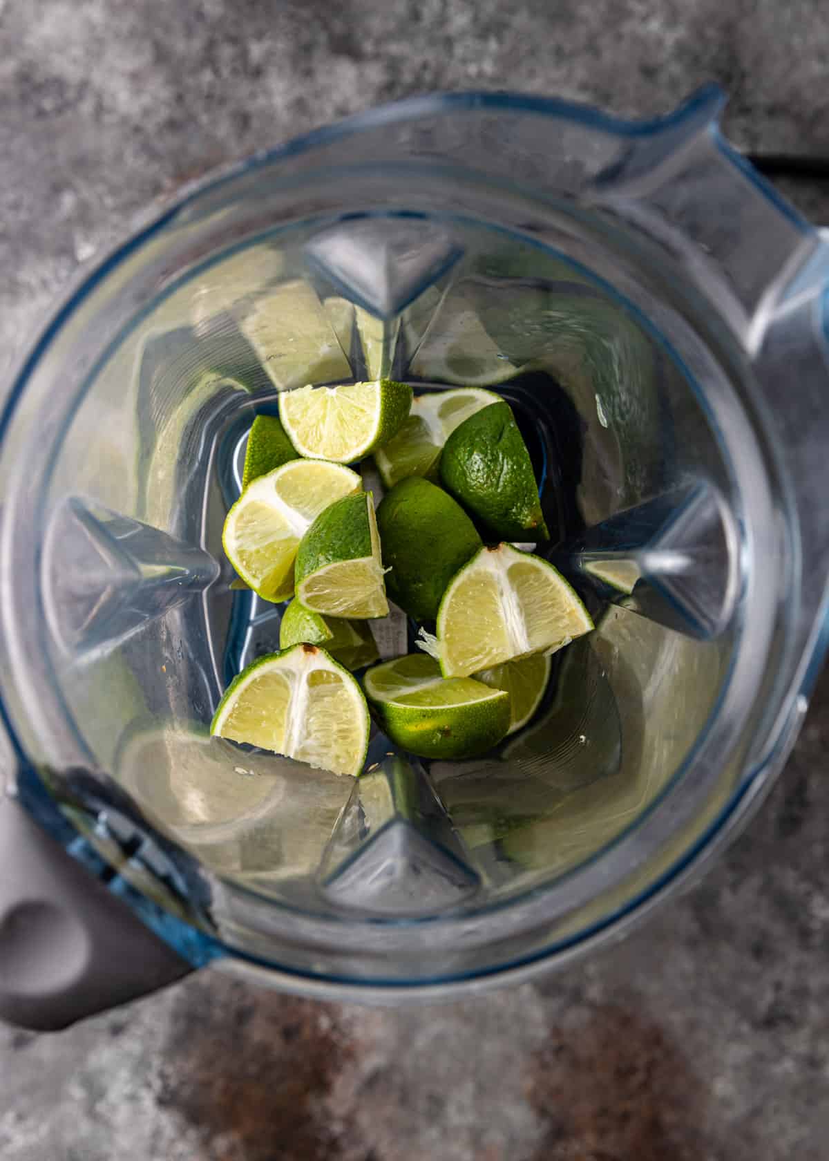 overhead: lime wedges in a blender