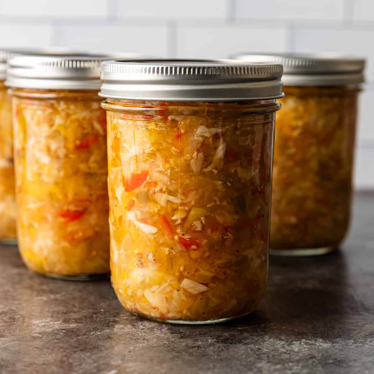 side view: several jars of Chow Chow relish 