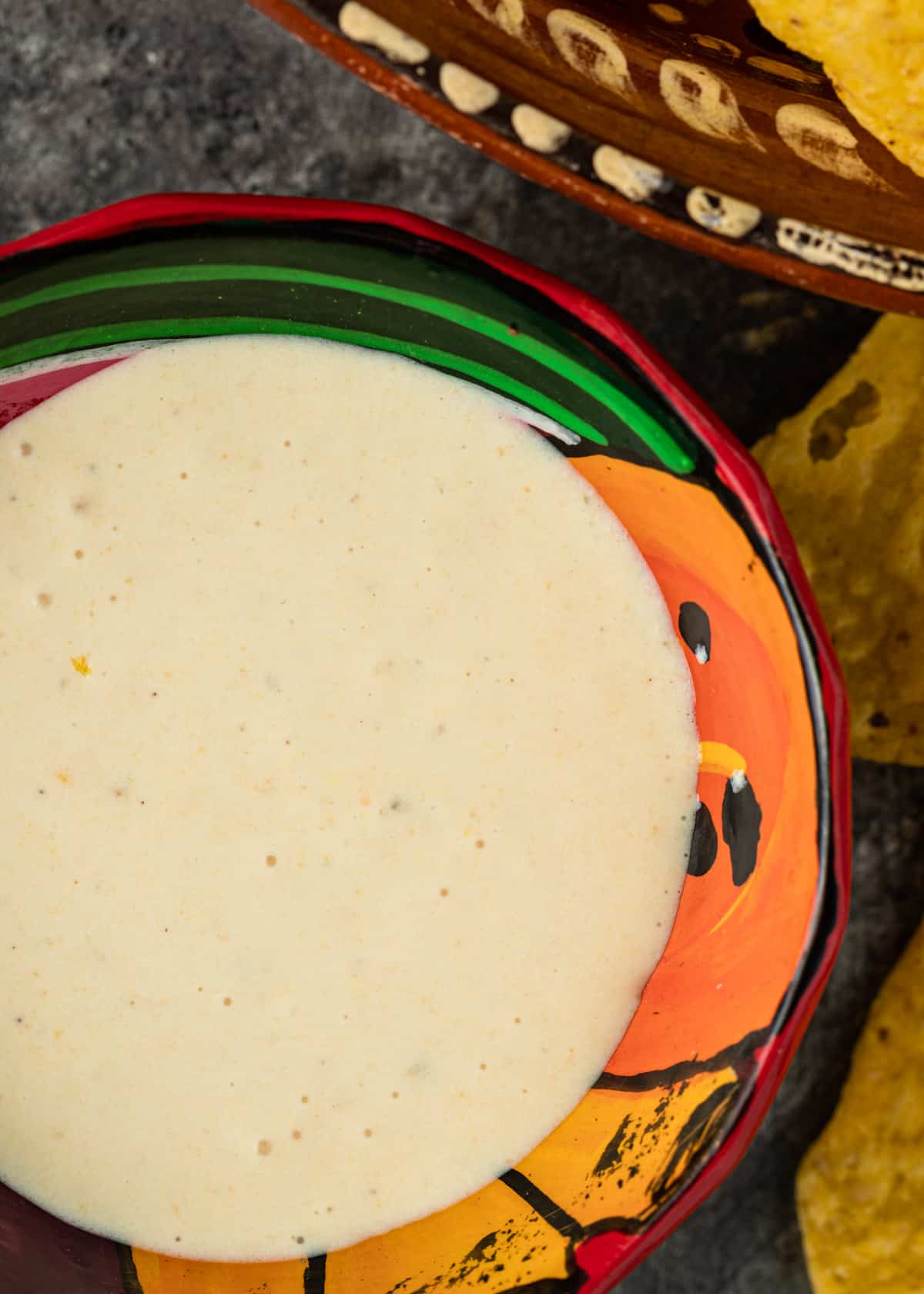 overhead closeup: a small ceramic bowl of habanero sauce